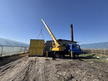 токмок кран: Манипулятор, Komatsu — 1