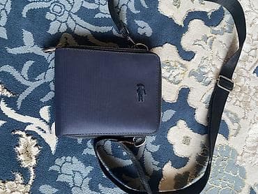 сумка на колёсах: Мужская компактная сумка через плечо. - Формат: вертикальная — 1