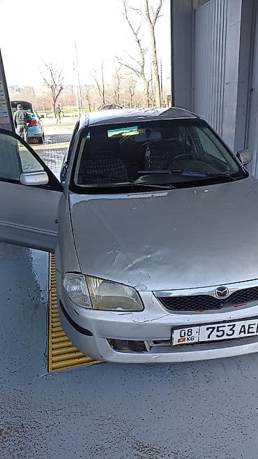 bmb 34: Mazda 323: 2000 г., Механика, Универсал — 6