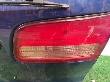 либера: Фонарь крышки багажника NISSAN LIBERTY M12 2 2003 прав. (б/у) — 1
