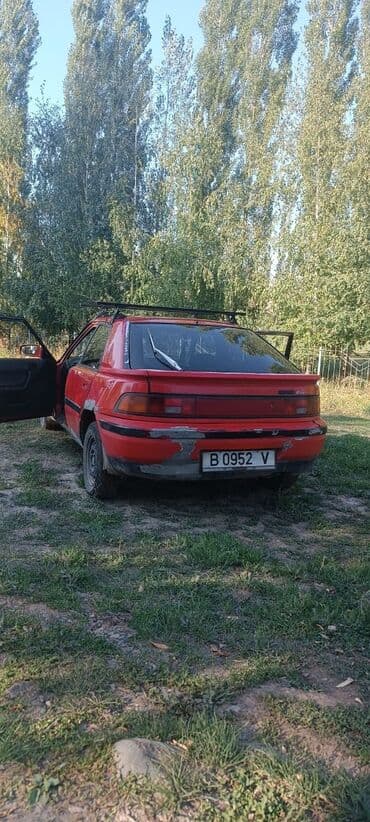 продаю в связи с переездом: Mazda 323: 1994 г., 1.6 л, Механика, Бензин, Универсал — 1