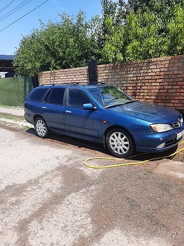 genesis 80: Nissan Primera: 2001 г., Универсал — 3