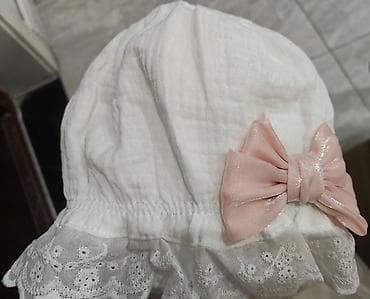 мурской шапка: Продаю НОВЫЙ чепчик с красивым розовым бантиком для девочки 5-8 — 2