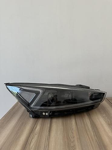 kia: Передняя левая фара Kia — 2