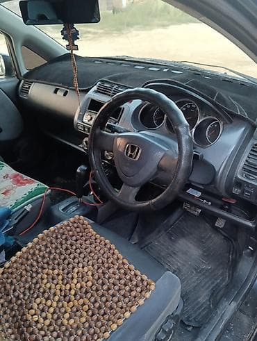 рул фит: Honda Fit: 2003 г., 1.3 л, Вариатор, Бензин, Хетчбек — 8