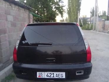 Продажа авто: Mitsubishi Lancer: 2003 г., 2 л, Бензин, Универсал — 4