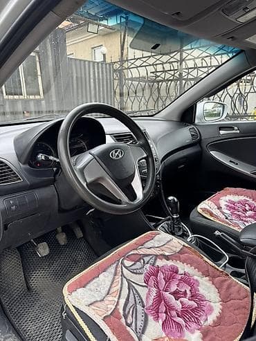 kia sportage 1: Hyundai Solaris: 2014 г., 1.4 л, Механика, Бензин, Седан — 7