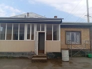 Кыймылсыз мүлк: Продаётся дом с большой застеклённой верандой. Описание: - Кирпичный — 1