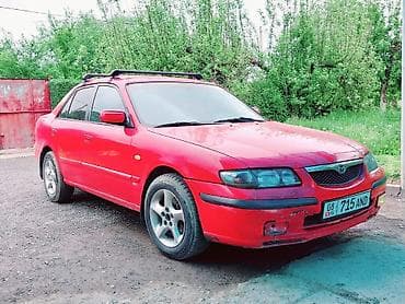 фара 200: Mazda 626: 1997 г., 1.8 л, Механика, Бензин, Седан — 1