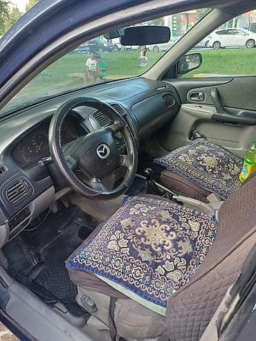 фары краун: Mazda 323: 2002 г., 1.6 л, Механика, Бензин, Хэтчбэк — 7