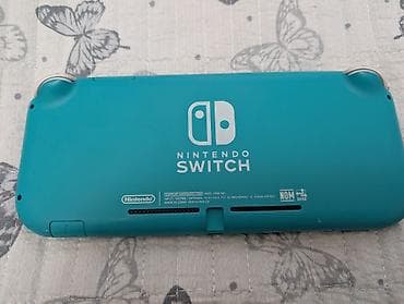 Техника и электроника: Продаю Nintendo Switch lite консоль чипованная . стоит прошивка — 2