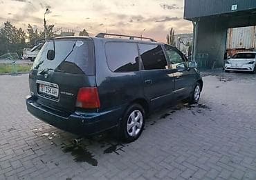 210 3 2: Honda Odyssey: 1995 г., 2.3 л, Автомат, Бензин, Минивэн — 1