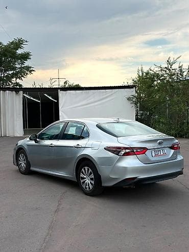 byd e5: Toyota Camry: 2022 г., 2.5 л, Вариатор, Гибрид, Седан — 4