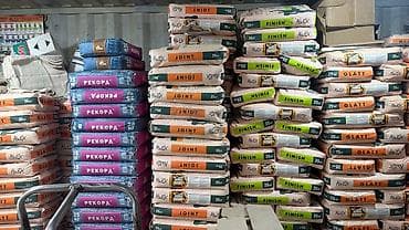 Сухие строительные смеси AlinEX и РЕКОРА, фасовка по 25 кг at lalafo.kg Сухие строительные смеси AlinEX и РЕКОРА, фасовка по 25 кг