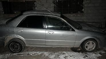 Унаа сатуу: Mazda 323: 2001 г., 1.5 л, Автомат, Бензин, Седан — 3