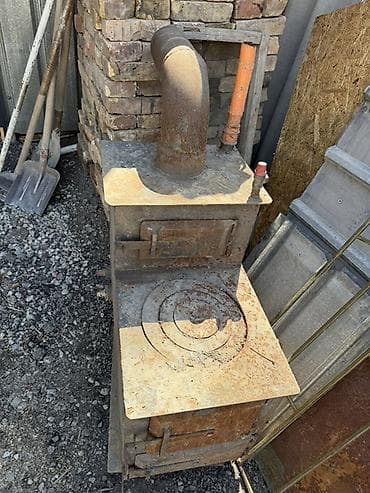 установка бассейна: Печь-«буржуйка» из стали с варочной поверхностью и дымоходом — 1