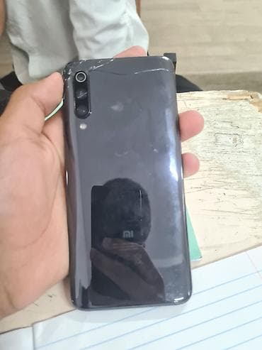 Xiaomi, Mi 9, 64 ГБ, цвет - Черный