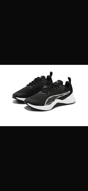 Кроссовки Puma, черные с контрастной белой подошвой и фирменной