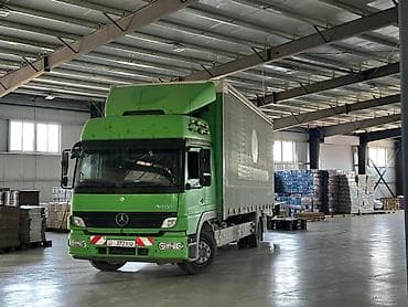 Грузовой автомобиль Mercedes-Benz Atego тентованный - Марка/модель