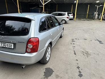 Mazda 323: 2004 г., Хэтчбэк — 5