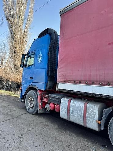 обмен авто на скот: Тягач, Volvo, 2002 г., Тентованный — 4
