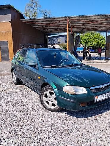 Mazda 323: 2000 г., Механика, Бензин, Универсал