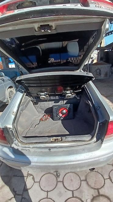 демо некся: Mazda Cronos: 1993 г., 1.8 л, Ручные, Бензин, Хэтчбэк — 6