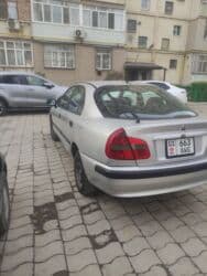 расрочка машина бишкек: Mitsubishi Carisma: 2000 г., 1.6 л, Механика, Бензин, Хэтчбэк — 4