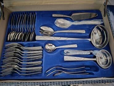 посуда оптом: Набор столовых приборов из нержавеющей стали в чемодане. Дизайн — 2