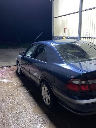 Унаа: Mazda 626: 1999 г., 1.8 л, Кол менен иштөөчү, Бензин, Седан — 4