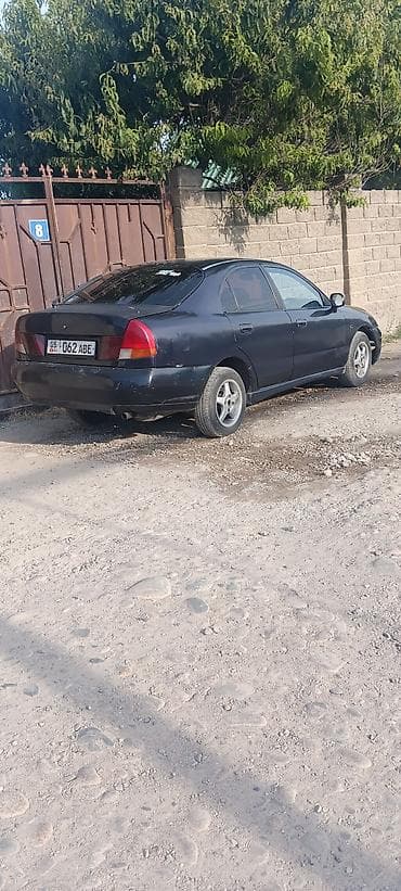 Mitsubishi Carisma: 1995 г., Механика, Седан — 2