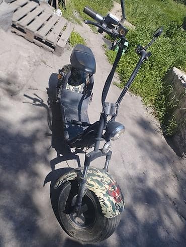 Электроскутер с широкими колёсами (citycoco‑тип) - Компоновка: низкая