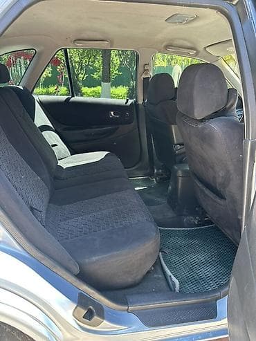атего 1229: Mazda Familia: 1998 г., 1.8 л, Автомат, Бензин, Универсал — 10