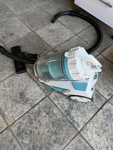 Пылесос циклонного типа без мешка для сбора пыли. - Контейнер для