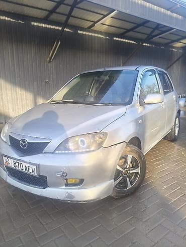 колор: Mazda Demio: 2004 г., 1.3 л, Автомат, Бензин, Хэтчбэк — 2
