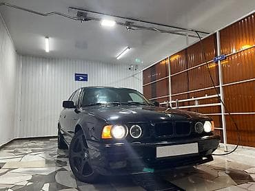 машина с российскими номерами: BMW 5 series: 1991 г., 2 л, Механика, Бензин, Седан — 1