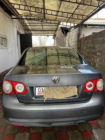 Транспорт: Volkswagen Jetta: 2010 г., 1.4 л, Автомат, Бензин, Седан — 2