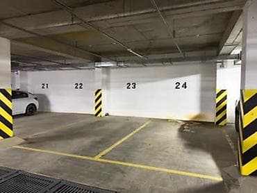 подземный паркинг: Парковочное место в подземном паркинге. В строящемся доме Гравити от Н — 1