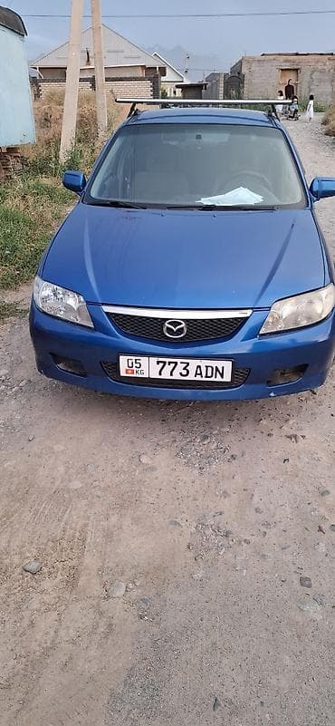 Mazda 323: 2002 г., Механика, Бензин, Хэтчбэк — 2