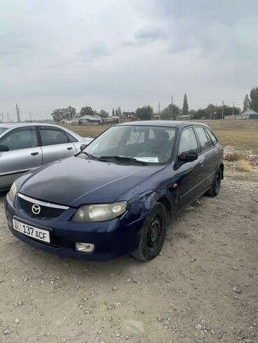 ручка нексия: Mazda 323: 2003 г., 1.6 л, Механика, Бензин, Хетчбек — 3