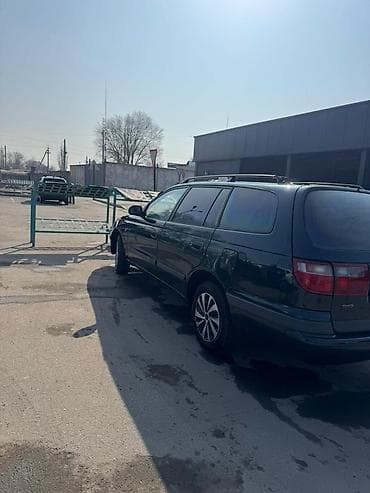 машина чанган фото цена: Toyota Carina E: 1993 г., 1.8 л, Механика, Бензин, Универсал — 4