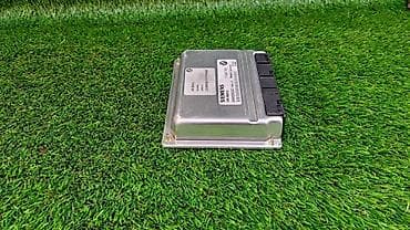 Блок управления двигателем Е83 7 548 769 Год 2004 В отличном