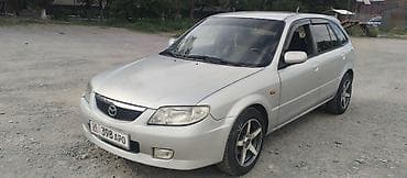 Mazda 323: 2001 г., 1.6 л, Механика, Газ, Хэтчбэк