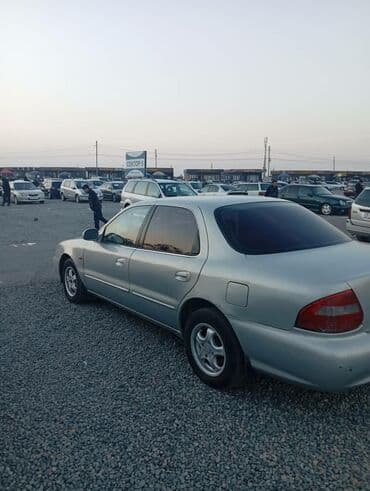 полик нексия 2: Kia Clarus: 2000 г., Механика, Бензиновая, Седан — 2