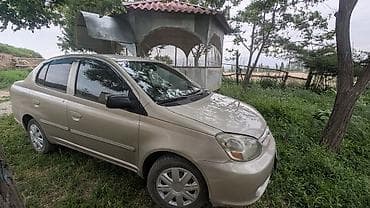 арзан машине: Toyota Echo: 2004 г., 1.3 л, Автомат, Бензин, Седан — 2