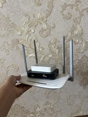 Продают роутер и приставку (приставка от акнет) модель роутера tp-link