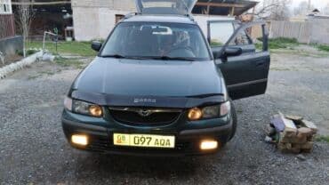 срочно продаю в связи с переездом: Mazda Capella: 1998 г., Механика, Бензин — 4