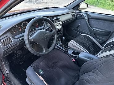 Унаа сатуу: Toyota Carina: 1996 г., 1.6 л, Кол менен иштөөчү, Бензин, Седан — 10
