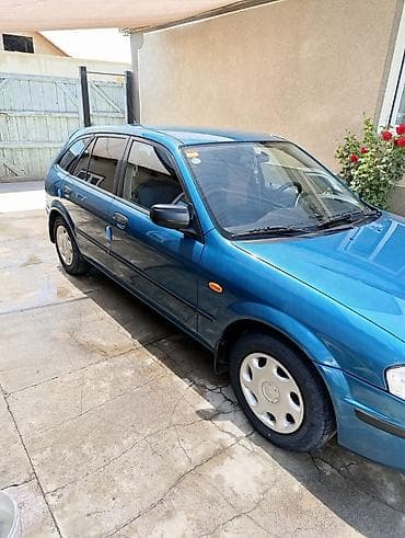 каропка на мазда: Mazda 323: 1999 г., 1.5 л, Автомат, Бензин, Универсал — 4