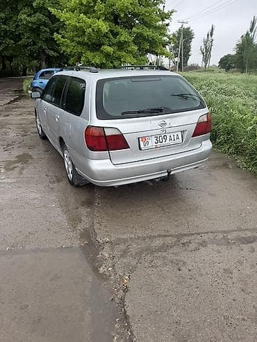 скутер танк 180: Nissan Almera Tino: 2001 г., Механика, Бензин, Универсал — 3